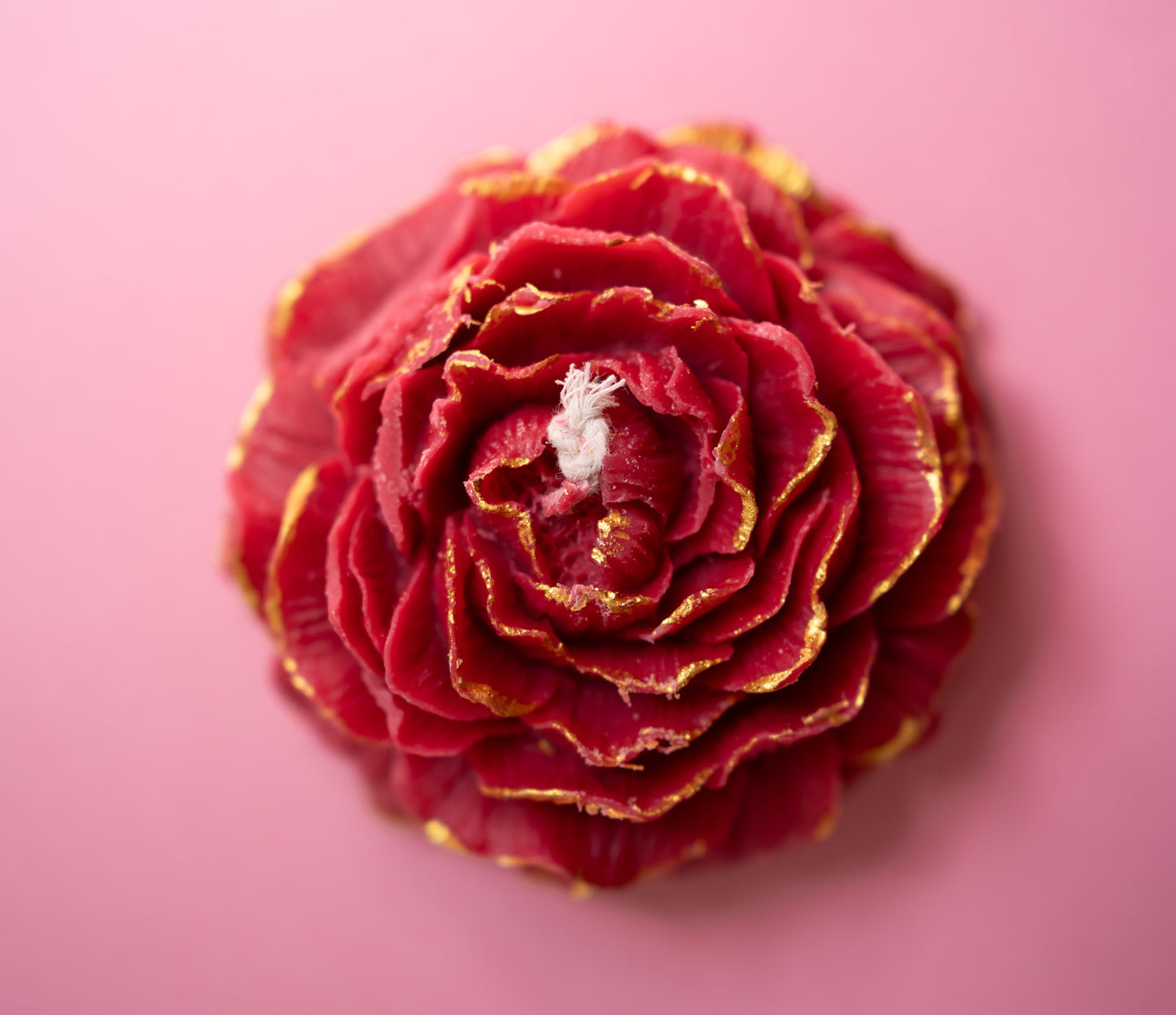 Vela: Rosa roja con dorado
