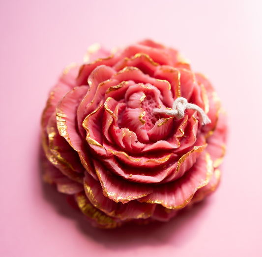 Vela: Rosado con dorado